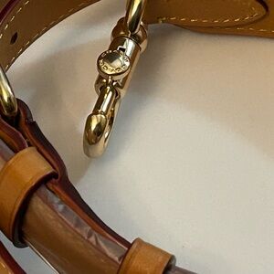 NWOT Coach leather adjustable crossbody strap.